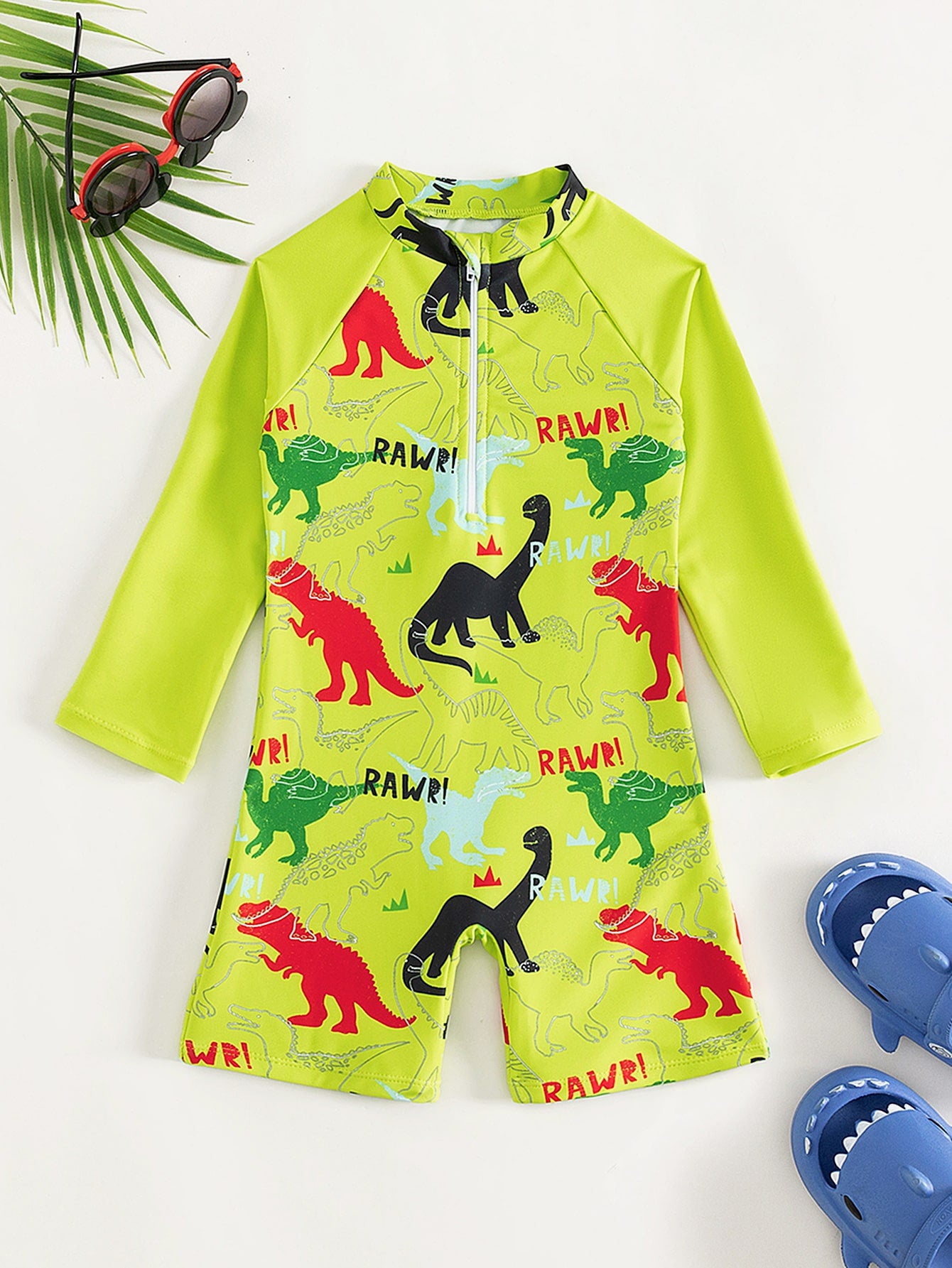 Traje de baño de una pieza con estampado de dinosaurio para niño