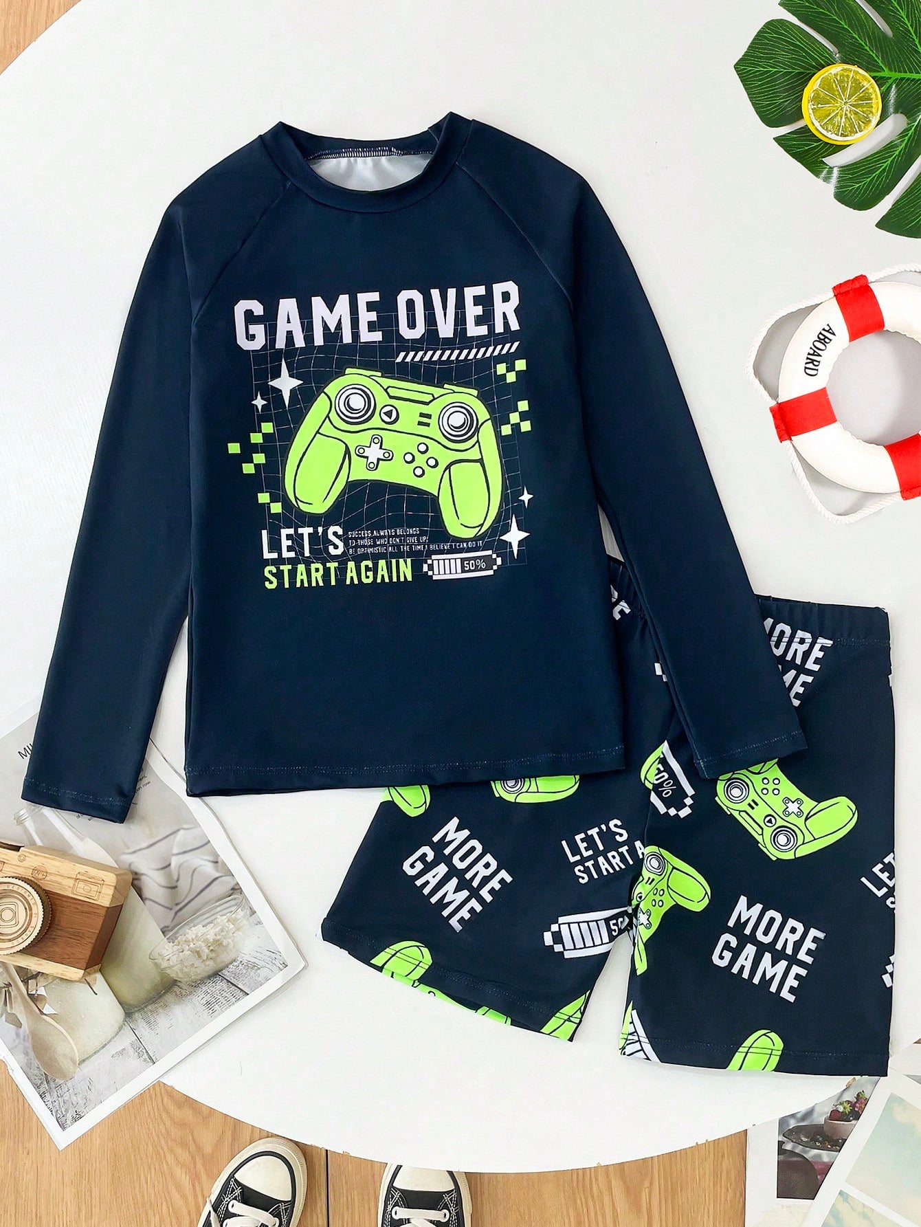 Conjunto de dos piezas de traje de baño tipo tankini para niño preadolescente con estampado de videojuegos que brillan en la oscuridado
