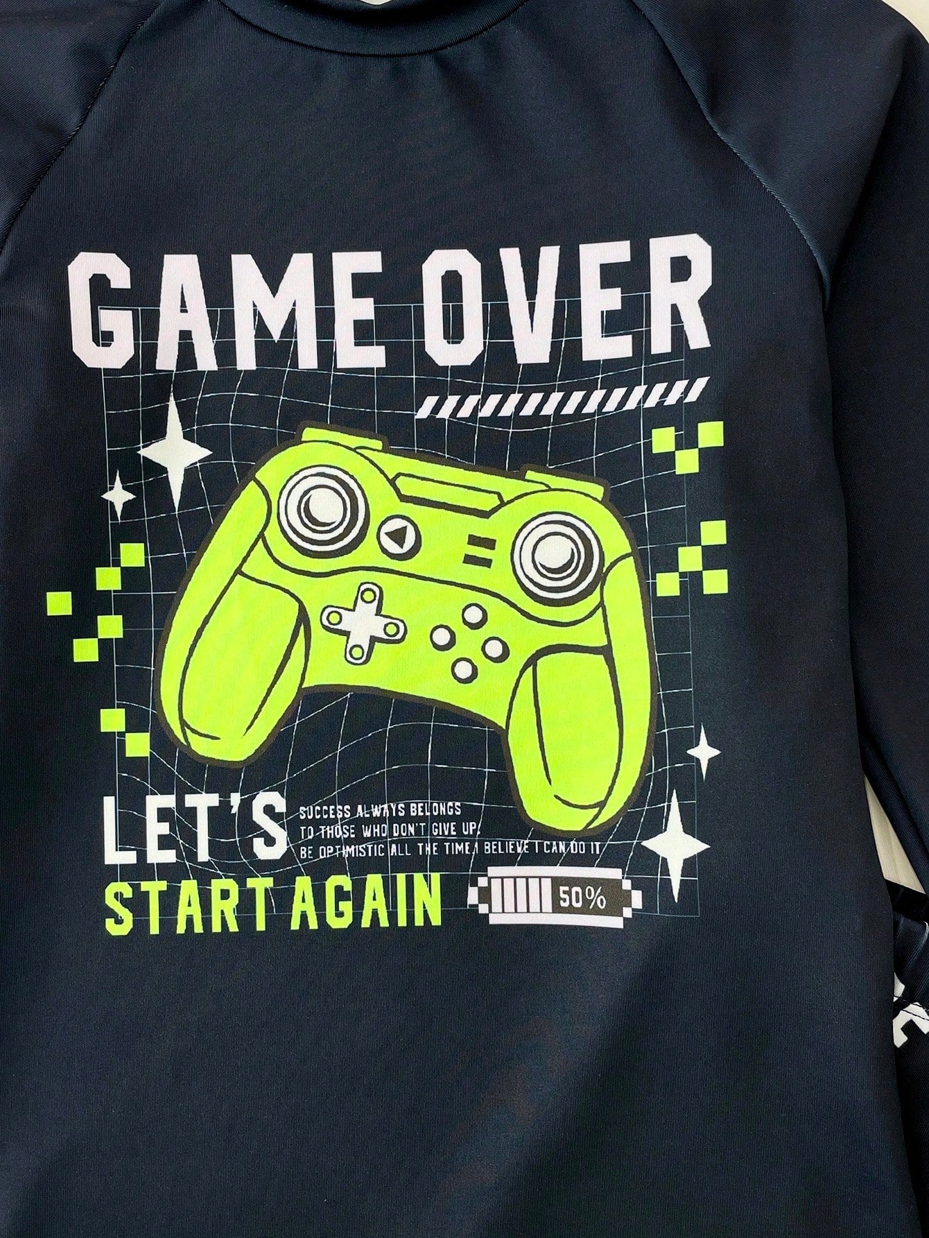 Conjunto de dos piezas de traje de baño tipo tankini para niño preadolescente con estampado de videojuegos que brillan en la oscuridado