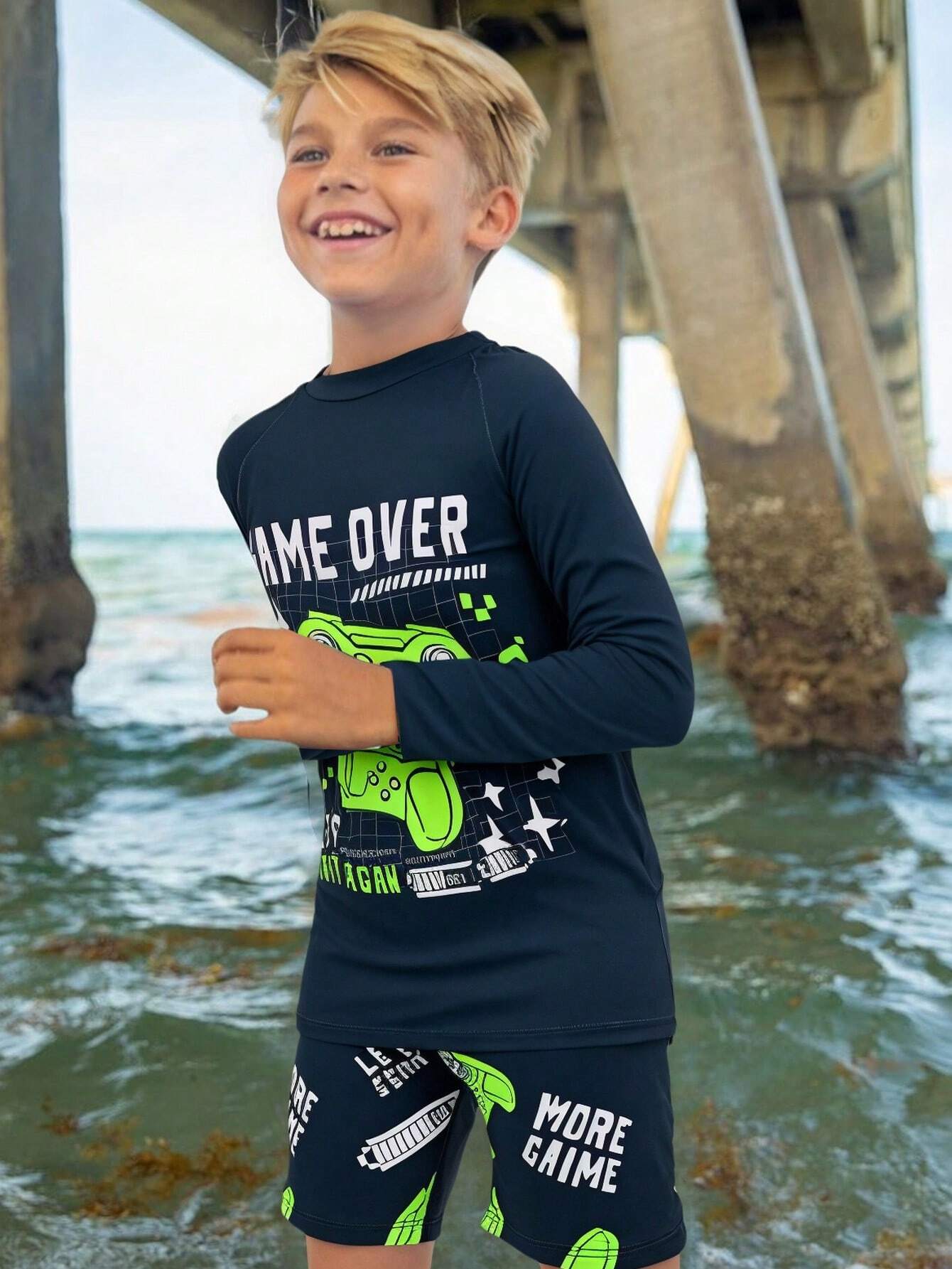 Conjunto de dos piezas de traje de baño tipo tankini para niño preadolescente con estampado de videojuegos que brillan en la oscuridado