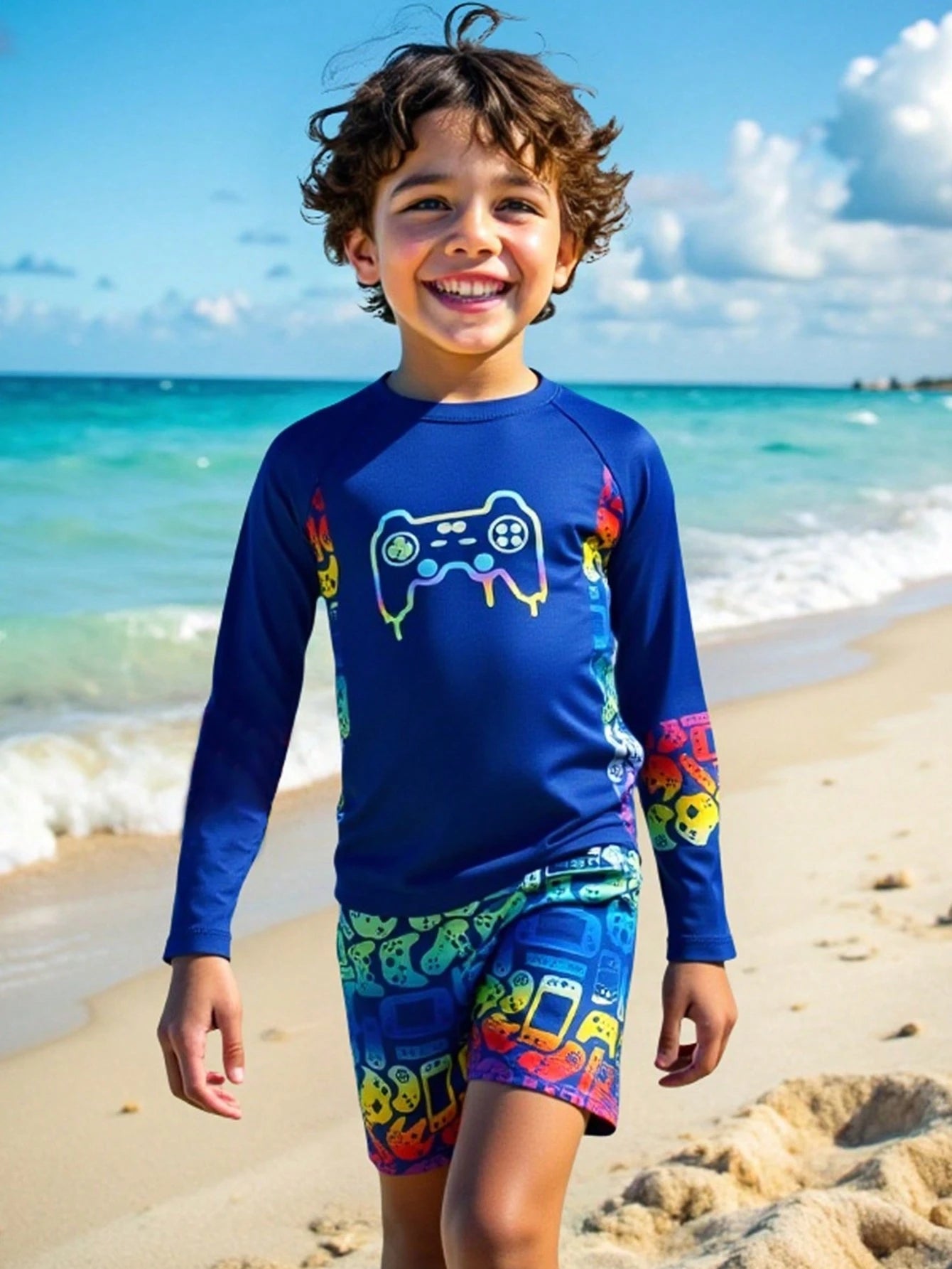 Conjunto de tankini con parte superior de manga larga y pantalón de baño con estampado de control de juego para niño pequeño